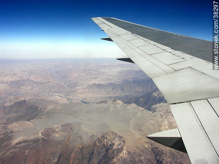 Wing plane and mountains -  - MORE IMAGES. Photo #38297