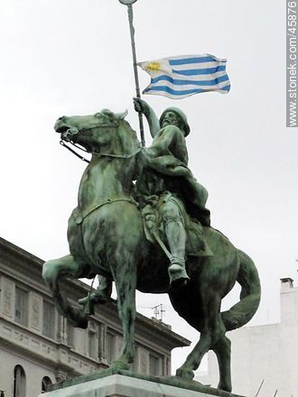 Monument to El Gaucho with an Uruguayan flag -  - URUGUAY. Photo #45876