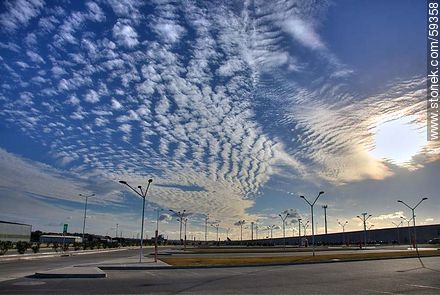 Airport parking with cirrus in the sky - Department of Canelones - URUGUAY. Photo #59358