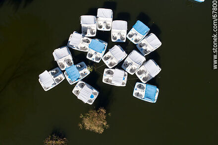 Aerial zenithal view of the boat slides in the centre of the lake - Department of Montevideo - URUGUAY. Photo #67800