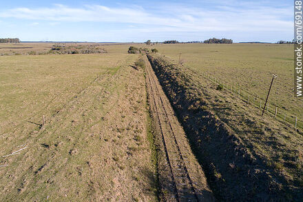 Aerial view of a straight section of railroad to the north at km 329 - Durazno - URUGUAY. Photo #69148