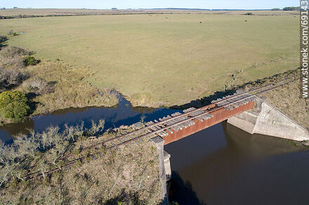 Aerial view south of the disused railroad bridge over Blanquillo Creek - Durazno - URUGUAY. Photo #69143