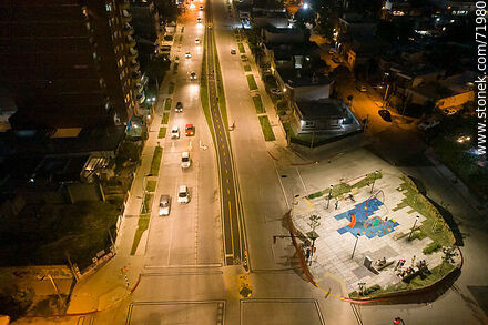 Aerial night view of the Miguel Hernandez plaza over L. A. de Herrera Ave. - Department of Montevideo - URUGUAY. Photo #71980