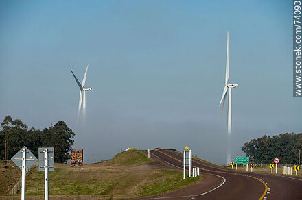 Wind turbines emerging from the morning fog near the Pampa station on Route 5. - Tacuarembo - URUGUAY. Photo #74093