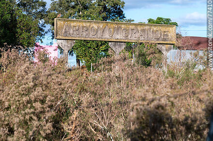 Arroyo Grande train station at Ismael Cortinas on the border of four departments. Station sign - Flores - URUGUAY. Photo #77410