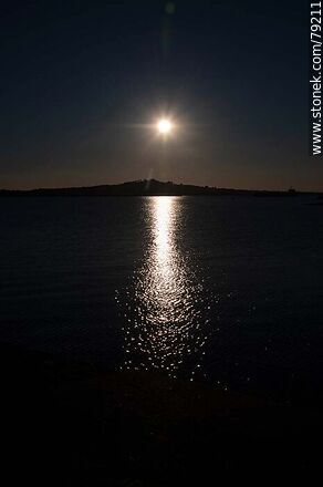 Silhouette of Cerro de Montevideo against the sun - Department of Montevideo - URUGUAY. Photo #79211