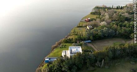 Foto aérea de residencias sobre la Laguna del Sauce - Department of Maldonado - URUGUAY. Photo #79403