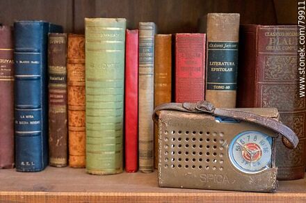 Antique Spica radio on a book shelf - Department of Montevideo - URUGUAY. Photo #79911