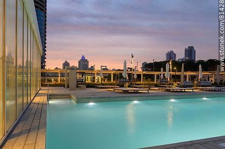 Outdoor swimming pool at sunset -  - MORE IMAGES. Photo #81428