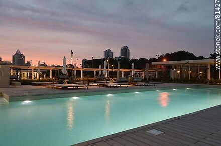 Outdoor swimming pool at sunset -  - MORE IMAGES. Photo #81427