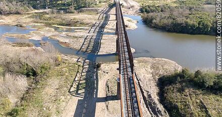 Aerial view of the recycled railroad bridge over the Santa Lucia river, departmental boundary between Canelones and Florida. Drought of 2023 - Department of Florida - URUGUAY. Photo #82059