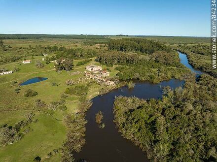 Aerial view of the Cuñapirú stream and the ruins of the old dam. - Department of Rivera - URUGUAY. Photo #84234