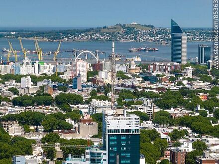 Aerial view of Montevideo city buildings, harbor bay, Antel tower and the Cerro - Department of Montevideo - URUGUAY. Photo #85363