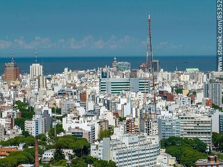 Aerial view of buildings in the city of Montevideo. Channel 4 antenna, Municipal Palace, BHU, DGI, Palacio Salvo, Ciudadela building and Radisson hotel - Department of Montevideo - URUGUAY. Photo #85352