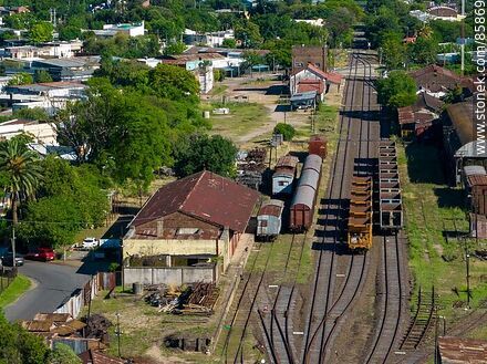 Aerial view of the Paysandú train station and its railroad tracks through the city - Department of Paysandú - URUGUAY. Photo #85869