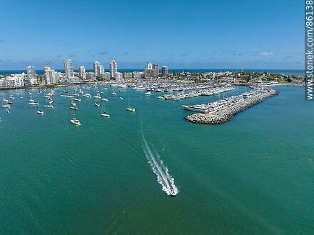 Aerial view of a boat leaving port - Punta del Este and its near resorts - URUGUAY. Photo #86138